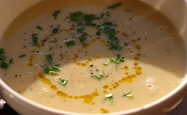 Corn Chowder w/ Crispy Shallots finished w/ Baklouti Green Chili Olive Oil